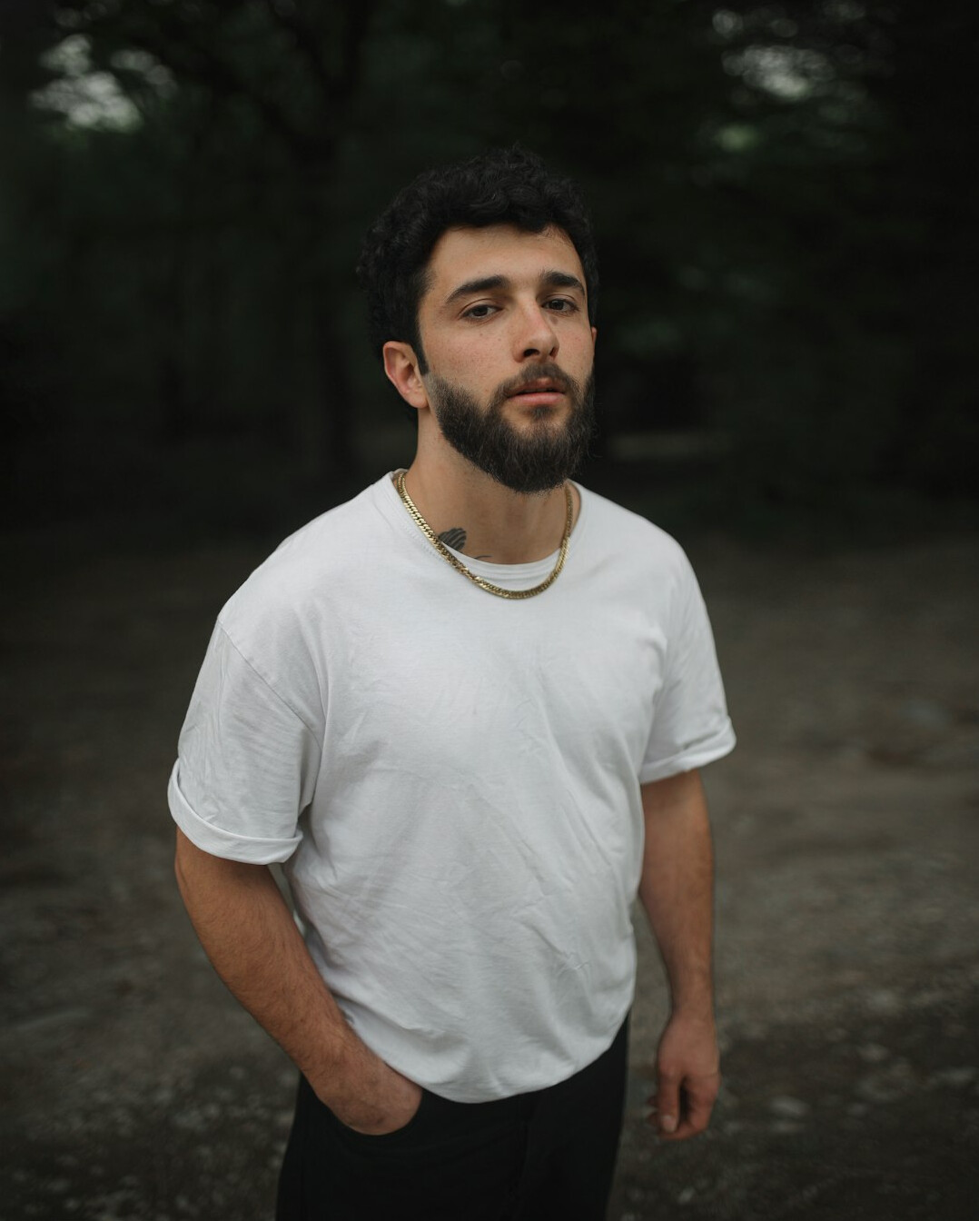 Portrait of a Polish man in his forties with short dark hair and a light beard